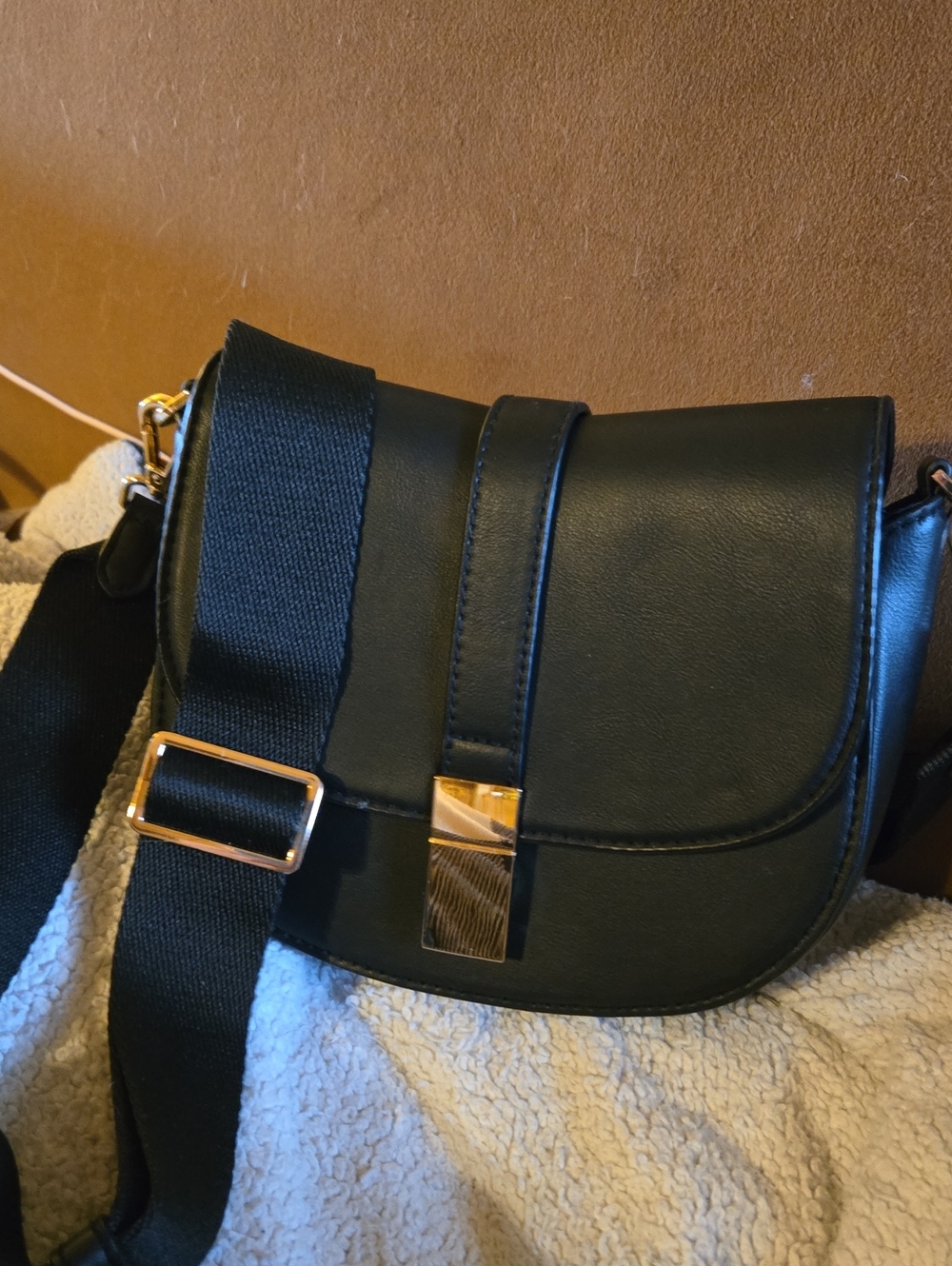 Black Leather Saddle Crossbody Bag with Gold Hardware